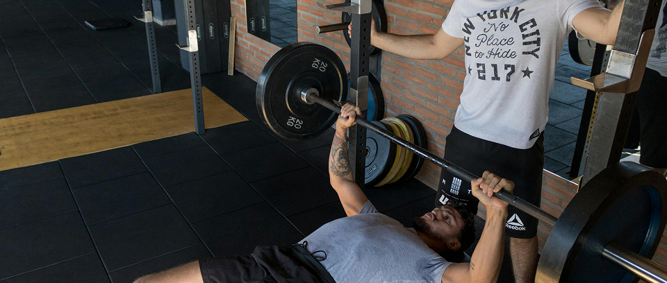 man lifting a weight